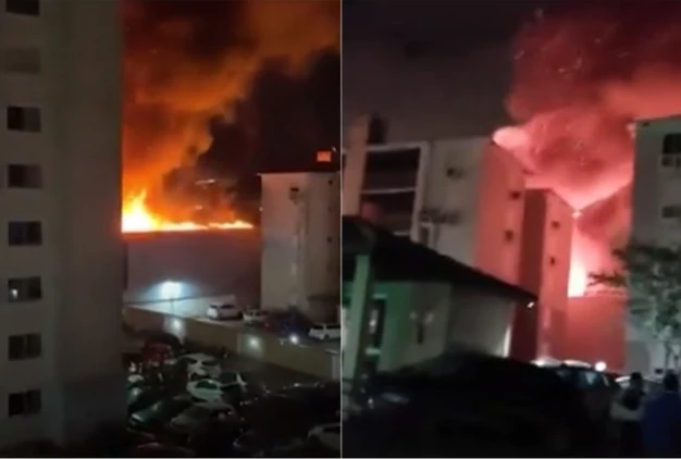 Grande incêndio atinge loja em bairro alagado de Porto Alegre
